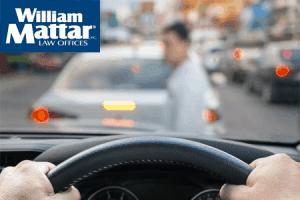 Pedestrain in Danger of being hit by a car